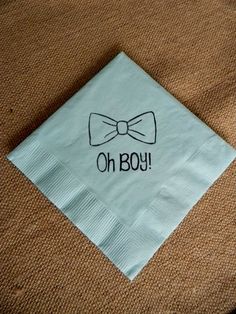 a napkin with the words oh boy written on it and a bow tie drawn on it