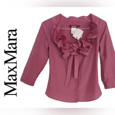 Maxmara Zampa Ruffle Pink Cotton/Silk 3/4 Sleeve Blouse Size 6 Size 6 Measurements (Laying Flat): Pit-To-Pit 17.5" ( Measured On Back Side) Sleeve 12.5" ( From Armpit To Hem) Lenght 25" Front, 22" Back Color: Lilac Pink Ruffled Neckline (Double Ruffles) Hidden Button Down Front Closure 3/4 Lenght Dolman Sleeve Gorgeous Semi-Shiny Fabric Material: 76% Cotton, 26% Silk Care: Hand Wash Cold Retail Price $395 New With Tags. From A Clean Smoke Pet Free House White Wrap Blouse, Cotton Poplin Top, Embellished Shorts, Lilac Pink, Flared Sleeves Top, Poplin Top, Printed Sleeveless Blouse, Shiny Fabric, Ruffled Neckline