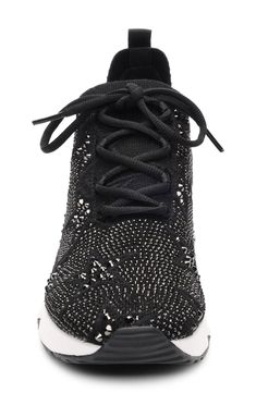 A flexible knit upper makes for easy on and off in a crystal-covered sneaker. Lace-up style Removable insole Textile upper and lining/rubber sole Imported Sporty Black Sneakers With Rhinestones, Black Sneakers With Rhinestones And Round Toe, Black Rhinestone Sneakers With Round Toe, Casual Black Sneakers With Rhinestones, Black Casual Sneakers With Rhinestones, Knit Sneakers, Nordstrom Store, Anniversary Sale, Up Styles