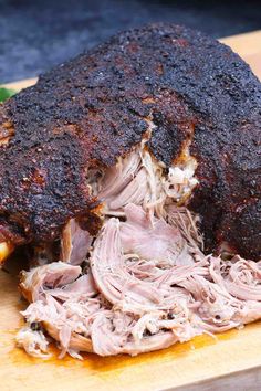 a large roast beef on a cutting board