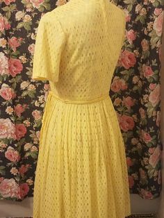 This dress is darling in a light lemon yellow. Measurements: Era 50s/60s 26 waist approximately a size 6 please refer to the measurements: 13' across waist laying flat 6' sleeve 6' collar Length 38' Bust 18.5 Free shipping U.S only please contact me if you need a accurate shipping quote outside the U.S. Yellow A-line Vintage Dress For Summer, 1950s Style Yellow Dress For Garden Party, Yellow 1950s Style Dress For Garden Party, Spring Yellow A-line Vintage Dress, 1950s Style Yellow Vintage Dress For Spring, 1950s Style Vintage Yellow Dress For Spring, Yellow Fitted Dress In 1950s Style, Fitted Yellow Dress In 1950s Style, Yellow Vintage Dress 1950s Style For Spring