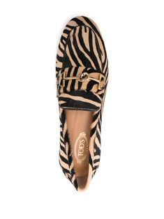 These loafers are like that perfect cup of tea you never knew you needed—stylish, comfortable, and with just the right amount of flair. The zebra motif adds a playful twist, making them a great conversation starter at any gathering. Slip them on and let your feet do the talking. Sand beige and black textured finish Tiger print with horsebit detail Easy slip-on style Round toe for comfort Branded leather insole Durable leather and rubber sole Mule Sneakers, Leather Cap, Sand Beige, Mens Gloves, Beach Tote Bags, Sneaker Heels, Tiger Print, Zebras, Handbag Shopping