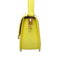 The Ella Wave Saddle Bag – This is the perfect day to evening bag with its 2 detachable straps a short leather shoulder strap and a mini crossbody chain strap. This bag embodies durability and timeless design, making it an essential addition to your wardrobe.  *The yellow-green Chartreuse bag comes in a small grained pebble leather.   Light gold-toned custom hardware Microsuede Lining Cow Leather Exterior Interior: 1 open pocket Comes with 2 Shoulder Straps: Leather Shoulder Strap 20. 5" attache Evening Rectangular Saddle Bag With Detachable Strap, Evening Satchel Saddle Bag With Detachable Strap, Rectangular Saddle Bag With Detachable Strap For Evening, Luxury Flap Bag With Adjustable Handle For Everyday Use, Formal Baguette Bag With Detachable Strap And Round Handle, Evening Saddle Bag With Detachable Strap And Double Handle, Chic Yellow Flap Bag For Evening, Elegant Yellow Bag With Detachable Strap, Chic Yellow Evening Flap Bag