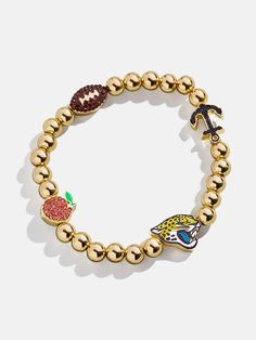 The Jacksonville Jaguars NFL Charm Bracelet is the ultimate accessory for die-hard football fans. Each bracelet is a celebration of your favorite team, featuring the Jaguars logo along with other charms related to the team and its iconic location. Perfect for game days or everyday wear, this bracelet adds a touch of sports-inspired elegance to any outfit. This bracelet features 6mm gold ball beads. This is an officially licensed NFL product. Casual Personalized Jewelry For Game Day, Adjustable Bracelets For Game Day, Football Season, Sporty Team-colored Jewelry For Game Day, Sporty Jewelry For Game Day, Jaguars Logo, Beaded Charm Bracelet, Jacksonville Jaguars, Bead Charm Bracelet, Die Hard