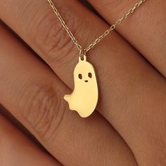 ✥ This 14K Gold Halloween Tiny Ghost Necklace is a charming and unique gift for her, perfect for celebrating the spooky season with a touch of elegance. The delicate pendant features an adorable tiny ghost design, crafted from high-quality 14K gold, adding a whimsical yet refined touch to any outfit. Its subtle and stylish look makes it an ideal accessory for Halloween festivities and a delightful Christmas gift. Whether you're surprising someone special or treating yourself, this tiny ghost nec Tiny Ghost, Ghost Necklace, Gold Halloween, Delicate Pendant, Halloween Festivities, Ghost Design, Bridal Bands, Halloween Jewelry, Rose Gold Metal