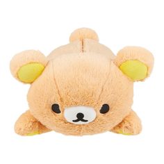 a brown teddy bear with yellow ears and eyes sitting down on a white background in front of the camera