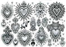 an assortment of heart tattoos on white paper