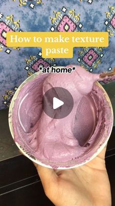 a person holding a bowl filled with purple food and text how to make texture paste at home