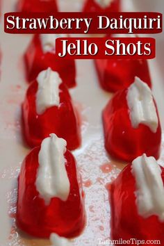 strawberry daiquiri jello shots on a white plate with text overlay that reads, strawberry daiquiri jello shots