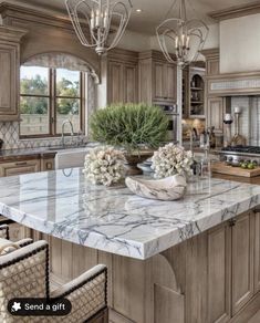 a large kitchen with marble counter tops and wooden cabinets