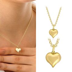 "This 14k Gold Dainty Necklace with Heart Pendant symbolizes the eternal power of love and craftsmanship. This necklace is handcrafted with care and boasts a traditional rolo chain that complements the trendy yet classic puffy heart charm. The heart, a global symbol of love and affection, delicately dangles from the chain, reminding you of the love that links you to those who are most important to you. It's more than simply jewelry; it's a message, a proclamation of love, and a treasured keepsak Heart Charm Necklace For Gifts, Double Heart Charms Jewelry For Anniversary, Double Heart Charms Jewelry For Anniversary Gift, Heart Pendant Jewelry With Adjustable Chain For Anniversary, Fine Jewelry Heart Pendant Charm Necklace For Valentine's Day, Fine Jewelry With Heart Charm For Gift, Heart-shaped Yellow Gold Charm Necklace In Sterling Silver, Adjustable Heart Pendant Jewelry For Anniversary, Yellow Gold Heart Necklace With Clavicle Chain For Gift