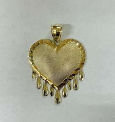 10K YELLOW GOLD HEARTS PENDANT PRODUCT DETAILS Jewelry Type:   Pendent Gold Karat:           10K Gram: 3.1 Height: 1.5" Width: 1  Metal Color: Yellow Metal Type: Gold Pendent Gold, Gold Hearts, Detailed Jewelry, Heart Pendant Gold, Fine Jewellery Necklace, Metal Color, Heart Of Gold, Gold Pendant, Heart Pendant