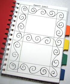 an open spiral notebook next to colored paper