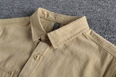 Casual Cotton Shirt With Placket, Cotton Shirt With Placket For Casual Wear, Cotton Shirt With Placket For Casual Gatherings, Casual Collar Cotton Shirt, Casual Collar Cotton Shirt With Buttons, Cotton Shirt With Casual Collar And Buttons, Khaki Cotton Top With Casual Collar, Vintage Linen Shirt With Relaxed Fit, Beige Cotton Tops With Casual Collar