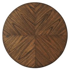 a round wooden table top with an intricate design