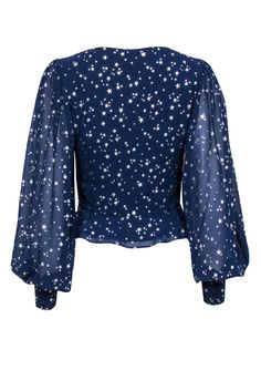 You'll be seeing stars in this flashy Yumi Kim blouse! Made with a sparkly star print and adorable peplum hem, this posh patriotic piece is perfect for a Fourth of July or Memorial day soiree! Style with white shorts and a bold red lip and you'll be all set for fireworks and hotdogs. Size S 100% Polyester Concealed side zipper Lined body Fitted silhouette V-neckline Long sleeve Star print design Faux buttons on front Peplum hem Bust 35" Waist 27" Sleeve length 28" Shoulder to hem 19.5" Fitted Star Print Tops For Fall, Fitted Long Sleeve Tops With Star Print, Fitted Tops With Star Print For Fall, Fitted Star Print Tops For A Night Out, Fitted Star Print Top For Night Out, Fitted Blue Top With Star Print, Star Print Tops For Night Out In Spring, Summer Tops With Star Print For Night Out, Spring Party Tops With Star Print