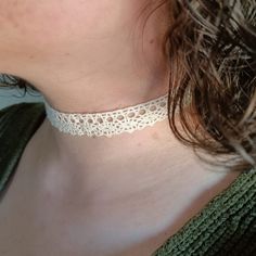 White lace choker with adjustable chain 🤍. Measurements: 33-38 cm long x 1.6 cm wide. Adjustable Cream Necklace, Adjustable Elegant Cream Choker, Elegant Adjustable Cream Choker, Elegant Cream Adjustable Choker, White Necklace For Festivals, Adjustable Cream Choker, Adjustable Lace Trim Choker, White Adjustable Choker Jewelry, Delicate White Choker