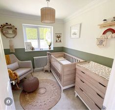 a baby's room with two cribs and a rocking chair in the corner