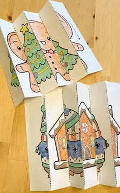 some paper cut out to look like houses