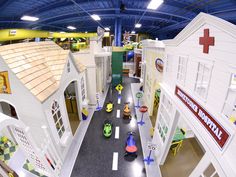 an aerial view of a toy hospital with children's toys on the floor and inside