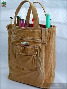 a brown bag filled with lots of pens and pencils on top of a white table