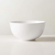 a white bowl sitting on top of a table