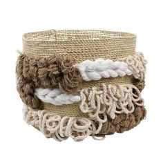 a close up of a basket with rope and yarn around it on a white background