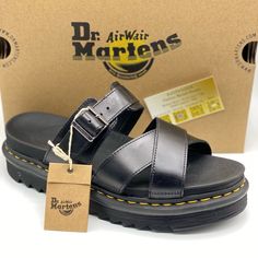 Dr Martens Ryker Unisex Sandals 10m 11l Black Leather Footbed Slides For Spring, Black Slides With Leather Footbed For Spring, Black Slides With Buckle Closure And Round Toe, Black Closed Toe Slides With Buckle Closure, Black Leather Footbed Slip-on Sandals, Black Sandals With Ortholite Insole And Round Toe, Black Leather Platform Slides, Black Open Toe Slides With Ortholite Insole, Dr Martens Gryphon Sandals