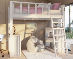 The image shows a loft bed with a desk and shelves. The bed is elevated off the ground and has a ladder leading up to it. The desk is compact and has a chair in front of it. There are books and other items on the shelves and desk. The color of the loft bed is white. The bed sheets are girly and pink. The bed is a girls bed. The background is on a beach. The time of day is sunset. Twin Loft Bed Diy, Under Loft Bed Ideas, Loft Bed Diy Plans, Under Loft Bed, Loft Bed Diy, Loft Beds For Small Rooms, Diy Loft, Colorful Bedroom Decor, Beds For Small Rooms