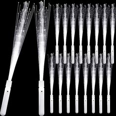 several different types of toothbrushes on a black background