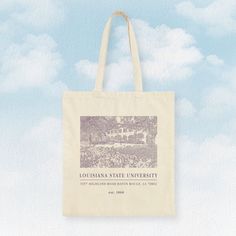 "Elevate your college style with our 100% cotton tote bag! 🎓👜 Embrace the campus vibes with a charming college design that's perfect for any occasion. 🏫💫Carry your books, laptop, and essentials in style and represent your college pride effortlessly. - 15\" x 16\" - 100% cotton canvas" Casual Campus Bags For Back To School, Casual Back To School Campus Bag, Casual Back-to-school Campus Bag, Casual Cotton Canvas Bag For Back To School, Back To School Cotton Canvas Tote Bag, Casual Cotton Bags For Back To School, Rectangular Cotton Canvas Bag For Back To School, Cotton Bags For Daily Use And Back To School, Back To School Cotton Bags For Daily Use