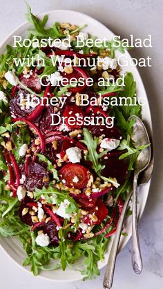 a salad with beets, goat cheese and honey balsamc dressing on a white plate