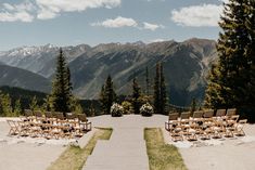 an outdoor ceremony set up in the mountains