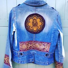 Beautiful customised denim jacket, size 12, Stunning female meditating embroidered patch finished with purple velvet piping, Purple silk detailed edging added to back and cuffs. A really unique design, only one made. Patch originally made in Belgium  Jacket originally made and sold by oasis retail. Jacket is a used item. Hippie Fitted Denim Jacket For Festivals, Fitted Hippie Denim Jacket For Festivals, Fitted Hippie Denim Jacket, Fitted Bohemian Denim Jacket For Festivals, Fitted Bohemian Outerwear With Patches, Female Meditating, Customised Denim Jacket, Embellished Denim Jacket, Denim Ideas