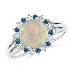 an opal and blue diamond ring