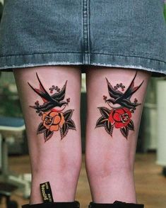 two women with matching tattoos on their legs