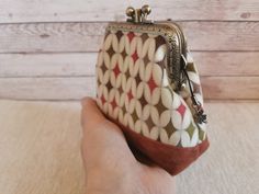 "Double Kiss Lock Coin Purse, vintage style Coin Purse, Double Pockets Coin Purse, Kiss clasp wallet, fabric Coin Pouch, unique gift for her Coin purse /kiss lock wallet Features: Measures: 3\" (8cm) width top 4\" 1/4 (10.5 cm) width bottom 4\" 1/4 (10.5 cm) Height 2\" (4.5 cm) Depth This coin purse is hand sewed by me. The fabric is really unique and particular The metal frame is in bronze vintage-style. No glue is used. I sew the metal frame with the fabric. The double pockets make everything well organized. Each pocket could be opened and locked individually. The coins could be kept in one side while the money bills, ID, credit cards, driving license could be stored in the other side. The Antique Bronze frame is clutch frame with sewing hole and clip clasp and is 3\" (8cm) wide, and ope Retro Pouch Coin Purse, Handmade Brown Vintage Pouch, Vintage Handmade Brown Pouch, Retro Pouch Wallets For Gifts, Retro Daily Use Coin Purse, Retro Coin Purse For Daily Use, Retro Pouch Clutch As Gift, Vintage Handmade Clutch For Everyday Use, Retro Handmade Pouch Coin Purse