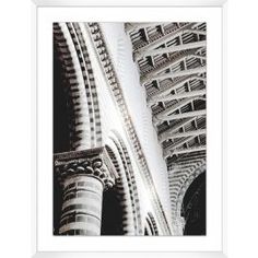 an image of the inside of a building with columns and arches in black and white