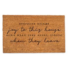 a door mat with the words, everyone brings pay to this house and then they leave