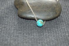 single turquoise bead necklace, sterling silver dainty necklace, tiny gemstone necklace Tiny turquoise bead necklace. Materials: - natural blue turquoise bead - 8 mm . - sterling silver delicate chain - silver components - because I use natural materials, they bead may vary in shape, size and color. Gift boxed. Link to my shop https://www.etsy.com/shop/SilverIrisJewelry?ref=hdr *INTERNATIONAL VAT TAXES & CUSTOMS FEE'S may be charged by your country's customs and/or postal system in order for Minimalist Turquoise Nickel-free Necklace, Sterling Silver Turquoise Gemstone Beads Necklace As Gift, Gift Turquoise Gemstone Beads Necklace In Sterling Silver, Gift Turquoise Sterling Silver Necklace With Gemstone Beads, Dainty Blue Turquoise Necklace In Sterling Silver, Minimalist Single Strand Blue Jewelry, Dainty Blue Sterling Silver Turquoise Necklace, Minimalist Blue Single Strand Jewelry, Minimalist Turquoise Necklace With Round Beads