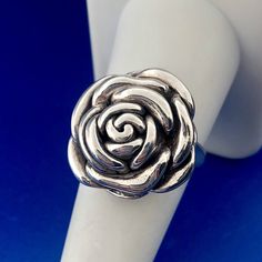 * Fun 925 Sterling Silver Textured Rose Camellia Flower Fashion Ring * Ring size: 8.75 * Top of ring measures: 7/8" x 7/8" * Band Width: 1/8" * Height: 1/4" * Weight: 5.6 g * Marked: 925 * Condition: Great. (225bluetopdupboxbr) * S1148    Exported By ExportYourStore :) Sterling Silver Rose Flower Ring For Anniversary, Sterling Silver Rose Flower Ring With Rose Design, Silver Flower-shaped Rings With Rose Design, Formal Rose Flower Shaped Rings, Formal Rose Flower Rings, Formal Rose Colored Flower Shaped Rings, Formal Flower Shaped Rings With Rose Design, Flower Shaped Rose Ring For Anniversary, Formal Flower-shaped Ring With Rose Design