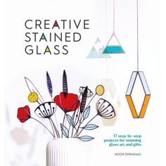 an advertisement for creative stained glass featuring flowers in a vase with geometric shapes hanging from the ceiling