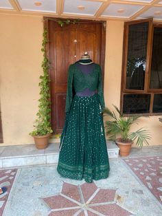 lehenga set  |womens bottle green  lehenga choli |crop top lehenga set |designer lehenga dupatta | wedding lehenga choli | mehendi outfit  lehenga usa Women's lehenga set /embroidery chikankari lehenga skirt with dupatta /chiniya choli /voggish/ langavoni       lehengas are one of the beautiful and versatile traditional attires of india !! we carry such pieces in budget with great quality that can be styled in multiple ways with different outfits !!       Here is Beautiful pure georgette chikank Green Lehenga With Unstitched Blouse For Navratri, Green Semi-stitched Anarkali Set With Unstitched Blouse, Floor-length Green Choli For Navratri, Green Floor-length Choli For Navratri, Fitted Anarkali Choli In Green, Green Anarkali Choli With Unstitched Blouse, Party Choli With Bandhani Print And Fitted Style, Fitted Floor-length Choli With Chikankari Embroidery, Fitted Pista Green Choli With Chikankari Embroidery