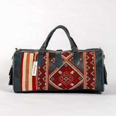 Artihandmade™ Leather Bag Are you looking for a fashion and trendy travel bag, for travelers who apreciate craftsmanship and handmade design. This kilim bag is a Must-Have for your outgoing trips due to the creative kilim patterns and high quality materials. We offer you a unique and light bag with real leather hand-dyed tanned you will certainly be in harmony with the cool and natural look. Easy to carry for Clothing-Traveling and Sports , With Two Side Pockets And Two In Interior For Accessori Traditional Rectangular Duffle Bag For Travel, Travel Tote Bag With Vegetable-tanned Leather, Artisan Shoulder Bag With Leather Lining For Travel, Artisan Shoulder Bag For Travel With Leather Lining, Traditional Rectangular Weekender Bag For Travel, Artisan Travel Shoulder Bag With Leather Lining, Traditional Satchel For Travel, Rectangular Vegetable-tanned Satchel For Travel, Traditional Leather Travel Bag