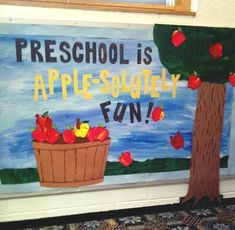 a sign that says preschool is apple - sautey fun with apples in a basket