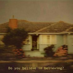 a house with the words do you believe in believing?