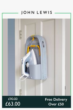 a magazine ad for john lewis with an ironing board attached to the door