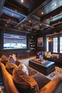 a living room filled with furniture and a flat screen tv mounted to the wall above it