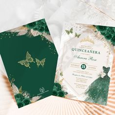 two wedding cards with green and gold designs on them, sitting next to each other