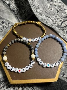 Three variations of pronoun bracelets: He/Him with pyrite, they them with faux agate, howlite and pyrite, and she/her with faux lace agate. Pronoun Bracelets, Lace Agate, Arm Band, Agate, Jewelry Bracelets, Beaded Bracelets, Bracelet, Lace, Clothes